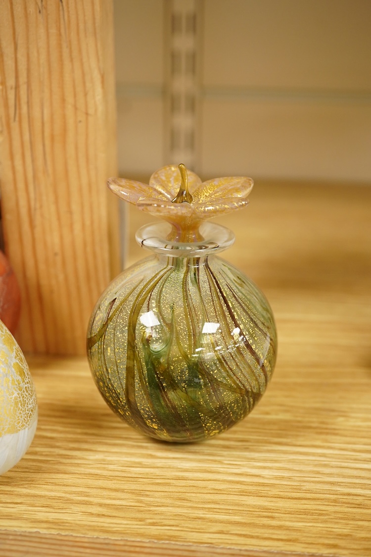 A collection of thirteen Isle of Wight scent bottles, tallest 15cm